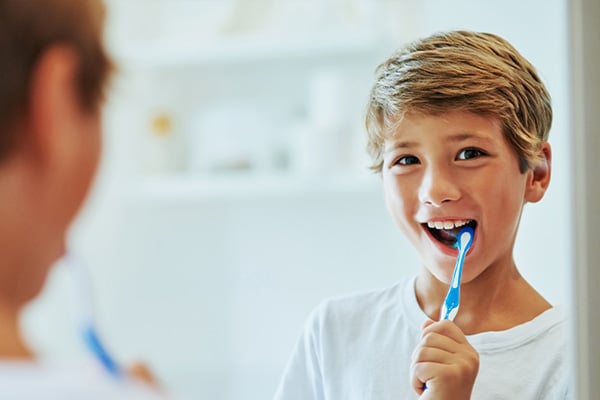 Brushing teeth at Valley Orthodontics in Decatur and Hartselle, AL